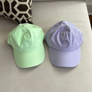 O OVERTIME HATS LIGHT PURPLE AND LIGHT GREEN OS NEW